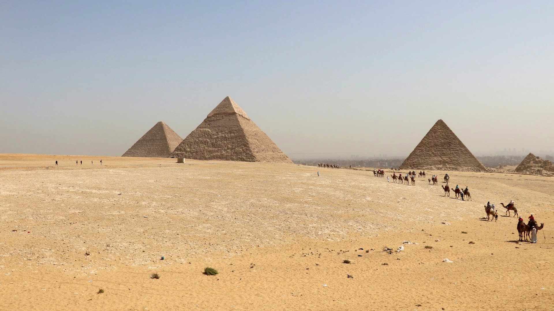 Ancient Egyptian passage and desert landscape in warm morning light